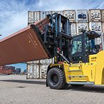 A special container rotator attachment fitted to a heavy-duty Hyster® Lift Truck can lift a dry container or reefer from the ‘short’ end